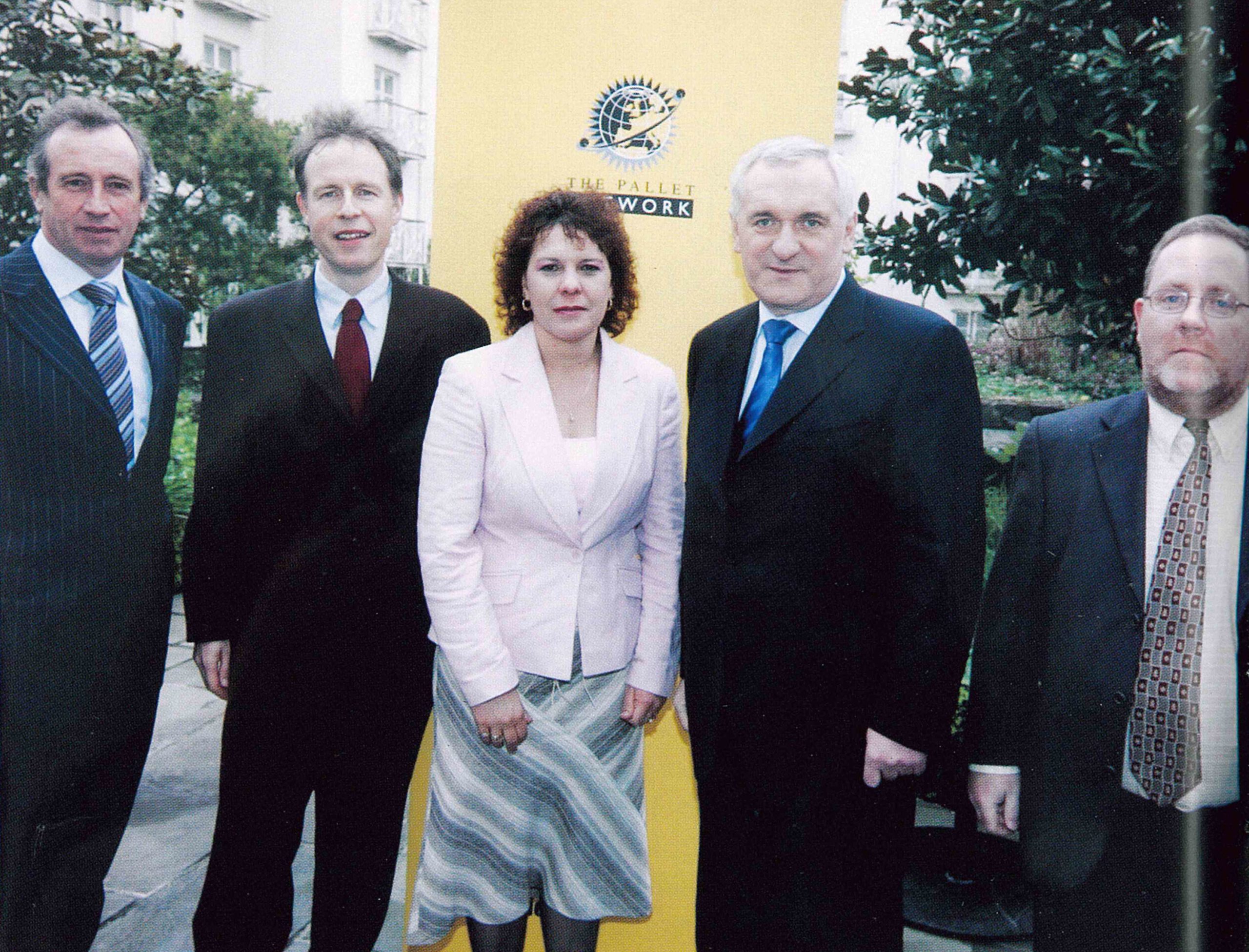 An Taoiseach, Bertie Ahern, at the official launch ceremony of TPN in 2005, with (L to R) Owen Cooke, Seamus McGowan, Aurora Drake, and Gary Costelloe.