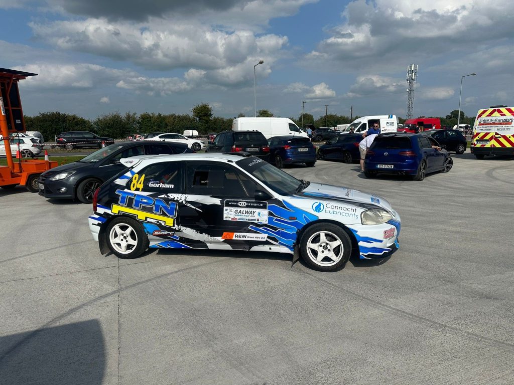 Jason Gorham and John Kilmartin's Honda Civic in Langan Couriers & The Pallet Network livery at the Galway Summer Stages Rally 2024.