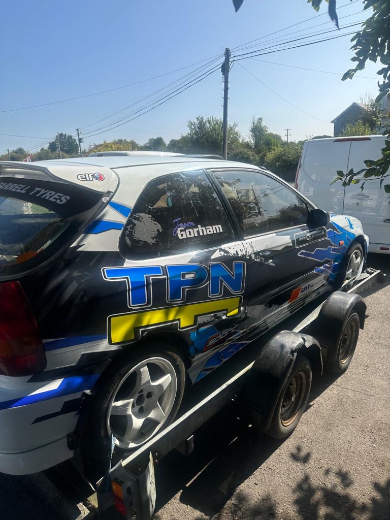 Jason Gorham and John Kilmartin's Honda Civic in Langan Couriers & The Pallet Network livery at the Galway Summer Stages Rally 2024.